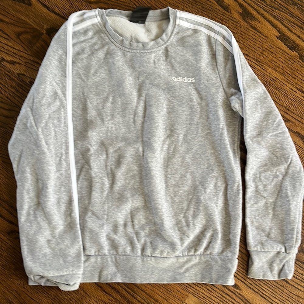 light grey adidas sweatshirt.